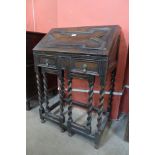 A Victorian Jacobean Revival oak geometric moulded barleytwist bureau