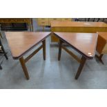 A pair of Danish teak triangular side tables