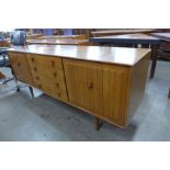 An Ensign teak and elm sideboard, by Bristow & Townsend