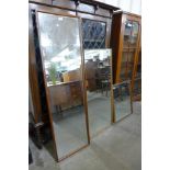 Three teak framed mirrors