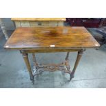 A William IV rosewood fold over games table