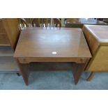 A teak writing desk