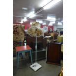 A mahogany hanging corner cupboard, oak nest of tables, standard lamp, 1950's drop-leaf kitchen