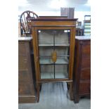 An Edward VII inlaid mahogany display cabinet