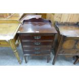 An Edward VII mahogany music cabinet