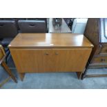 A Meredew teak two door record cabinet