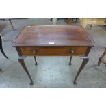 A George III style mahogany single drawer silver table