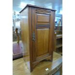 A Victorian walnut pot cupboard