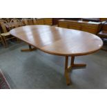 A Danish teak extending dining table