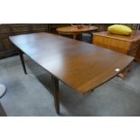 A Vanson mahogany extending dining table