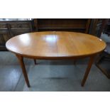 A McIntosh teak extending dining table