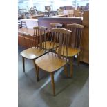 A set of four beech kitchen chairs