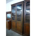 A large early 20th Century mahogany bookcase, 250cms h, 127cms w, 28cms d