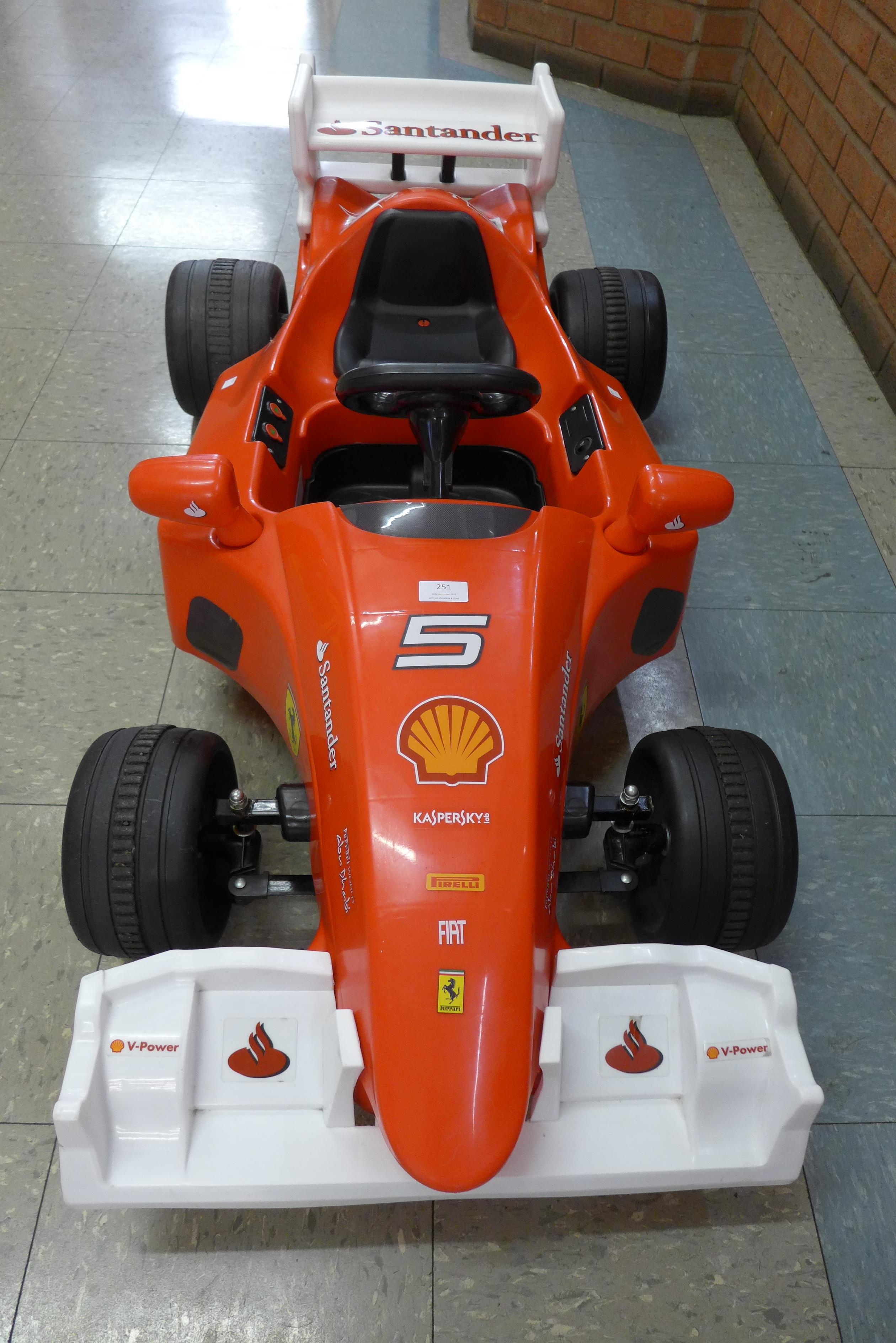 A limited edition Ferrari F1 Indy ride on car, Formula 1 W/12 volt battery power - with charging - Image 5 of 7