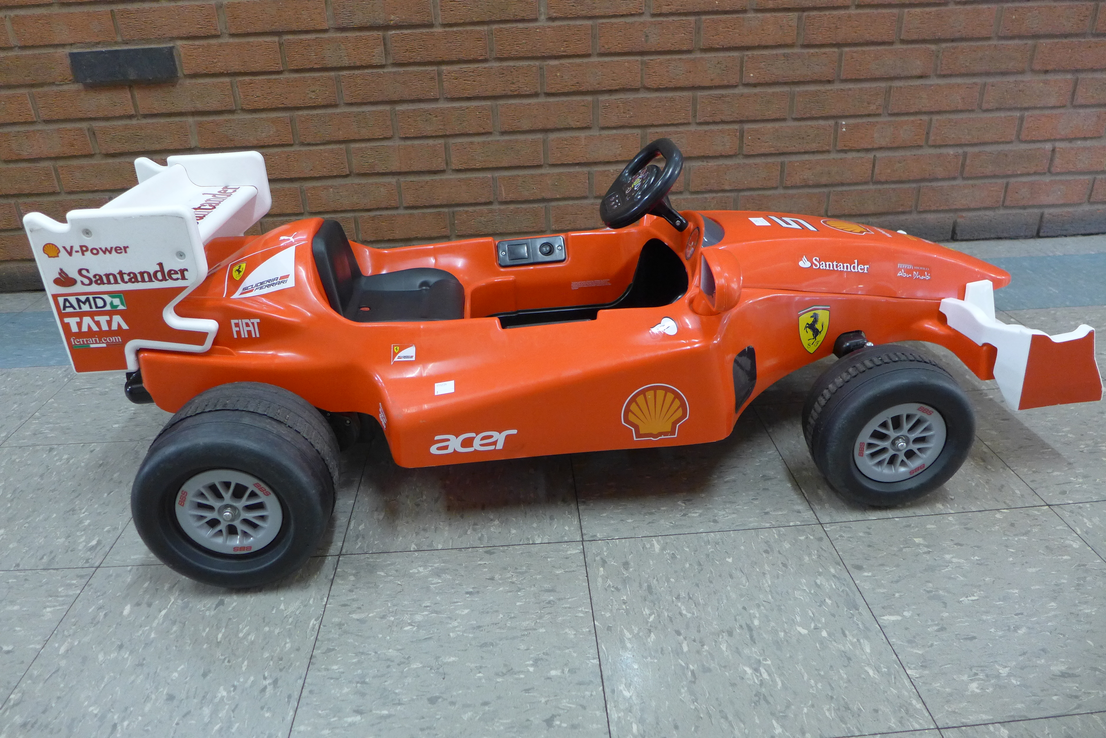 A limited edition Ferrari F1 Indy ride on car, Formula 1 W/12 volt battery power - with charging - Image 2 of 7