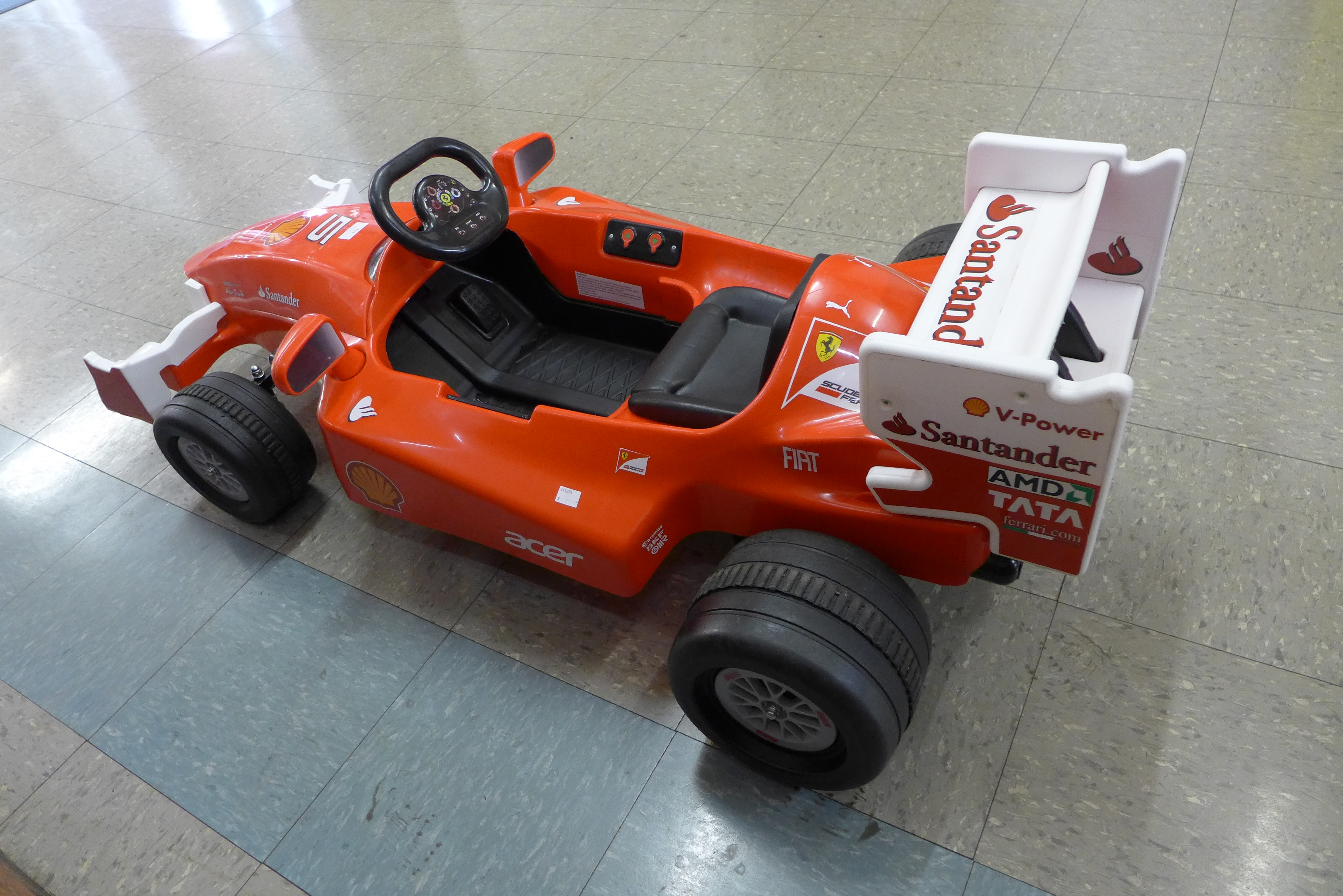 A limited edition Ferrari F1 Indy ride on car, Formula 1 W/12 volt battery power - with charging - Image 4 of 7
