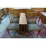 A McIntosh teak drop leaf table and four chairs