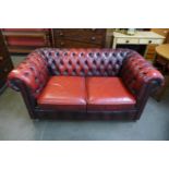 An oxblood leather Chesterfield Settee