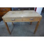 An Art Deco Heals style light oak two drawer desk, 74cms h, 101cms w, 61cms d