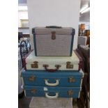 Two vintage suitcases, a picnic hamper and one other
