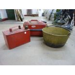 Two 1960's red petrol cans and a brass jam pan