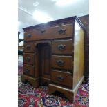 A George II oak kneehole desk