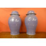 A pair of large purple porcelain ginger jars and covers