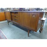 An Elliotts of Newbury walnut and afromosia sideboard