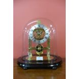 A gilt metal six spoke fusee skeleton clock