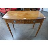 A George III mahogany bow front two drawer side table