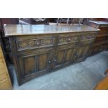 A 17th Century style carved Ipswich oak dresser