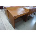 A teak writing desk