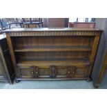 A carved Ipswich oak open bookcase