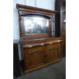 An Edward VII walnut mirrorback sideboard