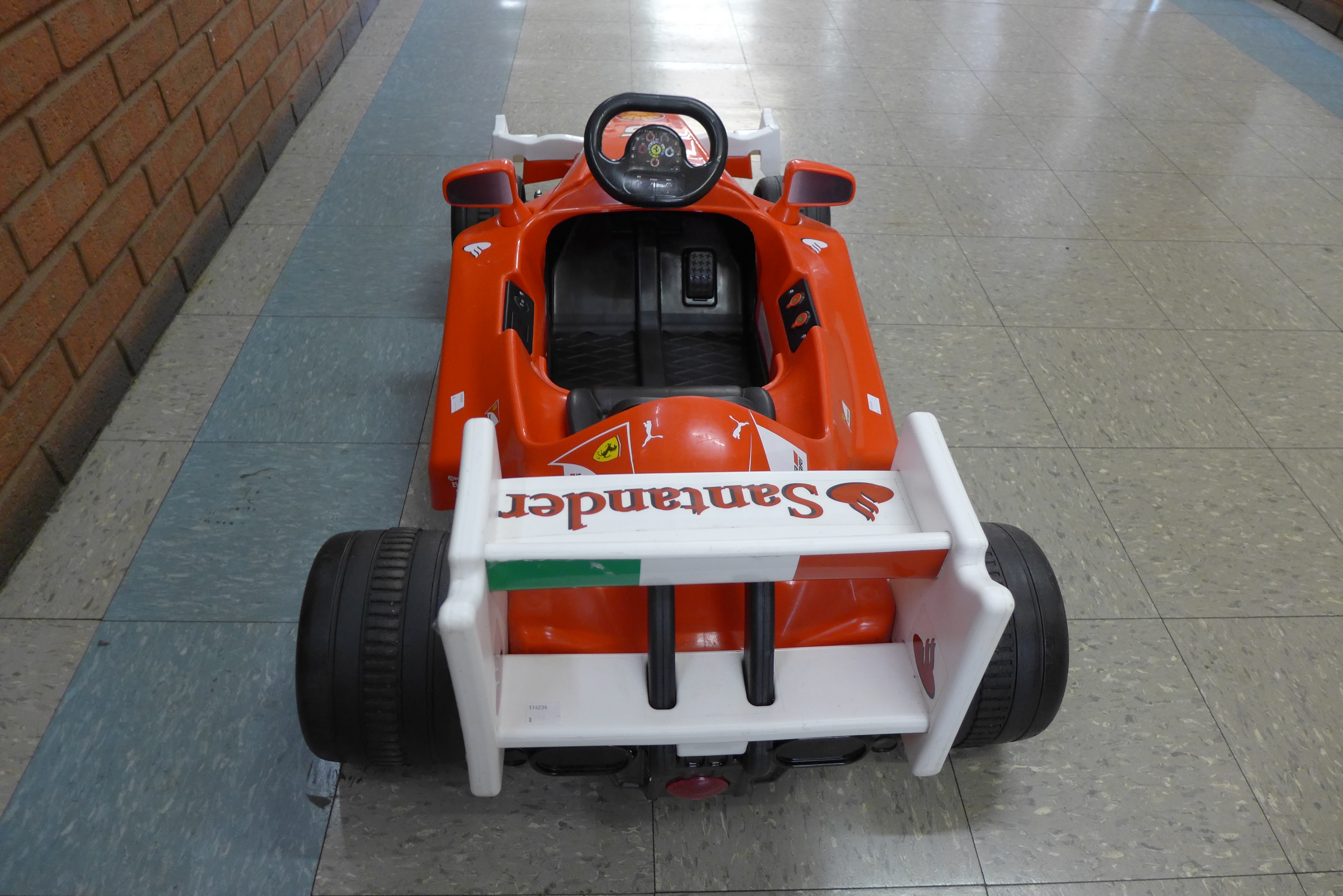 A limited edition Ferrari F1 Indy ride on car, Formula 1 W/12 volt battery power - with charging - Image 3 of 7