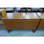 A Meredew teak two door record cabinet