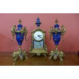 An Imperial gilt metal and cobalt blue porcelain clock garniture