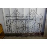 A pair of wrought iron garden gates