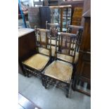 A set of four early 20th Century beech bergere dining chairs