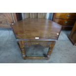 A carved Ipswich oak octagonal coffee table