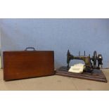 A 19th Century Frister & Rossman walnut cased sewing machine