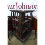 An Edward VII mahogany revolving bookcase