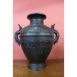 A large oriental bronze two handled vase, 46cms h