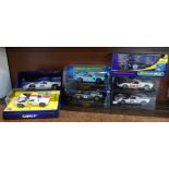 Six GT40 slot racing cars, four Scalextric and two Fly Car models