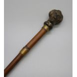 A 19th Century bamboo sword stick with carved horn handle, handle a/f and cane split, length without