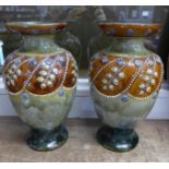 A pair of Royal Doulton stoneware vases, impressed marks to base, 28.5cm, one a/f