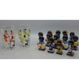 Thirteen Robertsons advertising band figures, four boxed and two drinking glasses with New Orleans