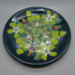 A Moorcroft plate, 26cm, boxed