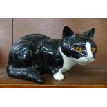 A Mike Hinton black and white cat figure, 003 painted backstamp