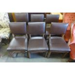 A set of six Arts and Crafts oak and brown leather upholstered chairs